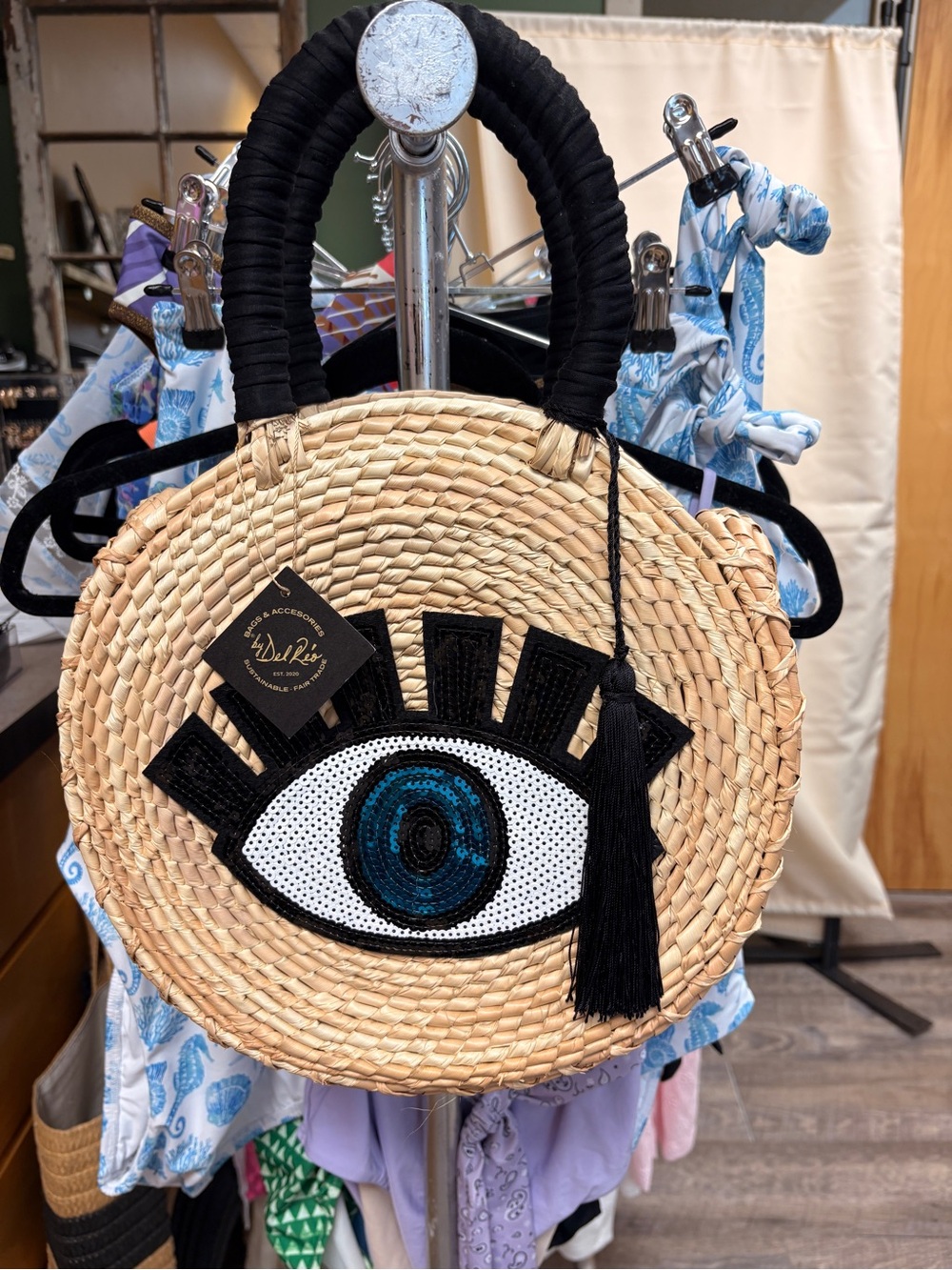 Handwoven Straw Tote with Black Handle and Blue Eye Appliqué